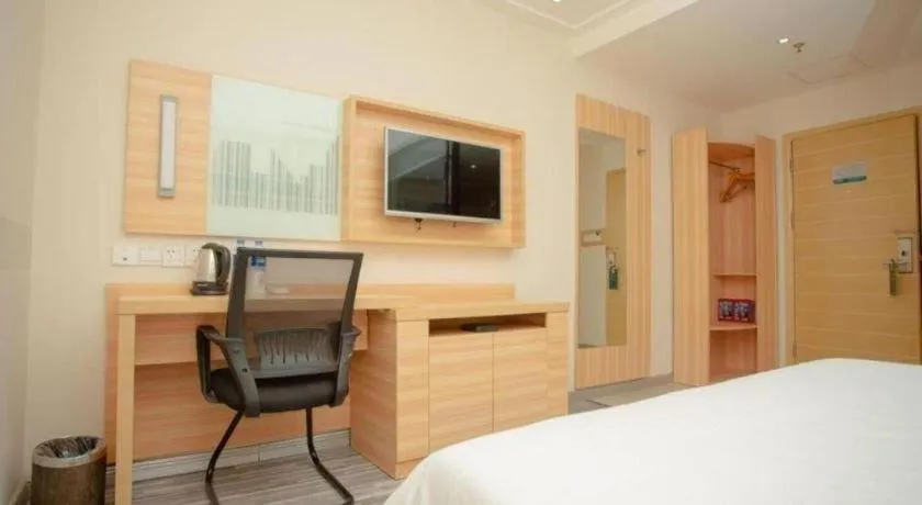 Bed in City Comfort Inn Zhongshan Xiaolan Xinduhui Gymnasium