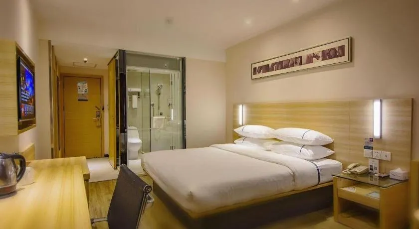 Bed in City Comfort Inn Zhongshan Xiaolan Xinduhui Gymnasium