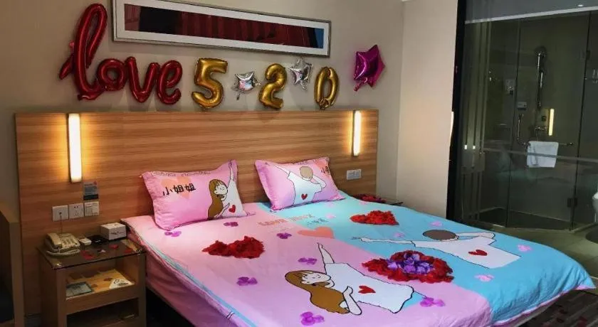 Bed in City Comfort Inn Zhongshan Xiaolan Xinduhui Gymnasium