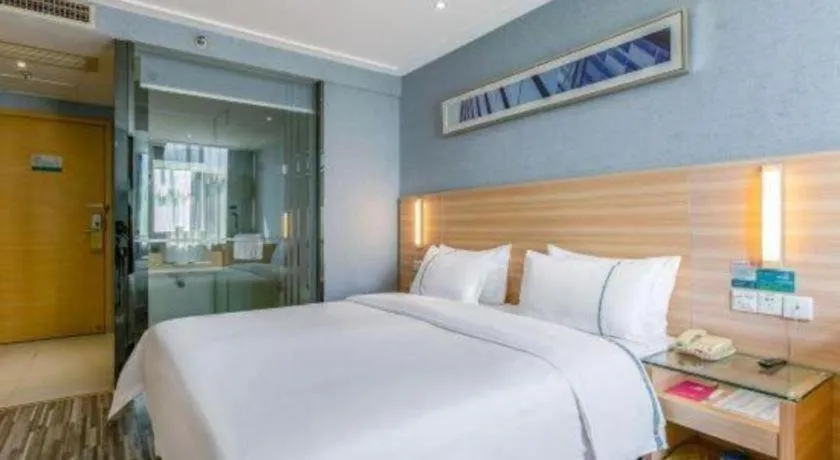 Bed in City Comfort Inn Zhongshan Xiaolan Xinduhui Gymnasium