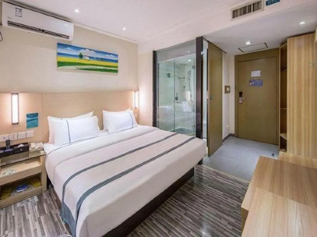 Bed in City Comfort Inn Zhongshan Xiaolan Xinduhui Gymnasium