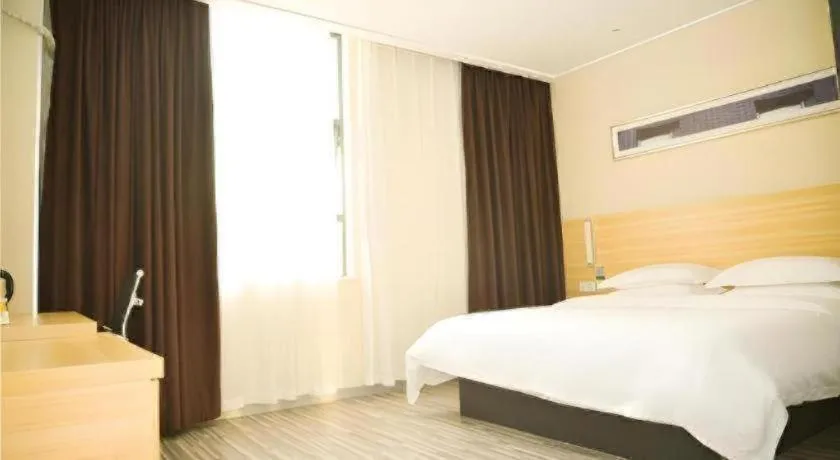 Bed in City Comfort Inn Zhongshan Xiaolan Xinduhui Gymnasium