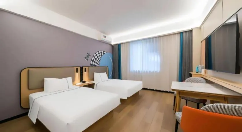 Bed in City Comfort Inn Huanggang Wuxue Bus Center