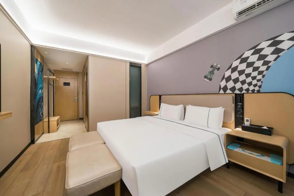 Bed in City Comfort Inn Huanggang Wuxue Bus Center