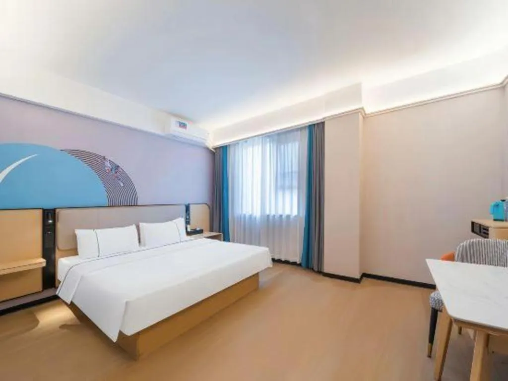 Bed in City Comfort Inn Huanggang Wuxue Bus Center