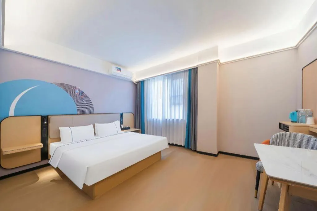 Bed in City Comfort Inn Huanggang Wuxue Bus Center