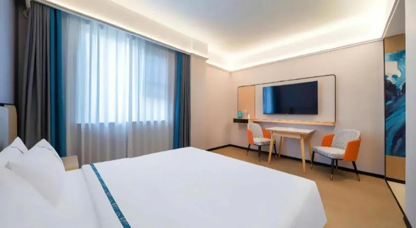 Bed in City Comfort Inn Huanggang Wuxue Bus Center