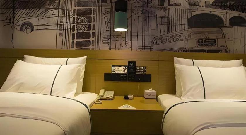 Bed in City Comfort Inn Huanggang Wuxue Bus Center