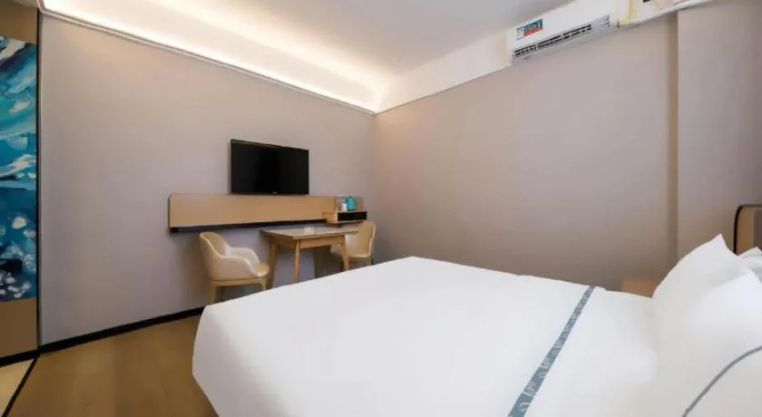 Bed in City Comfort Inn Huanggang Wuxue Bus Center