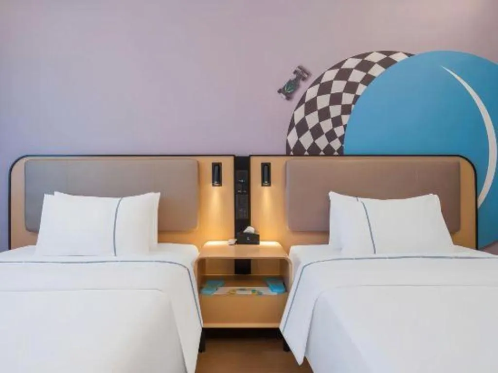 Bed in City Comfort Inn Huanggang Wuxue Bus Center