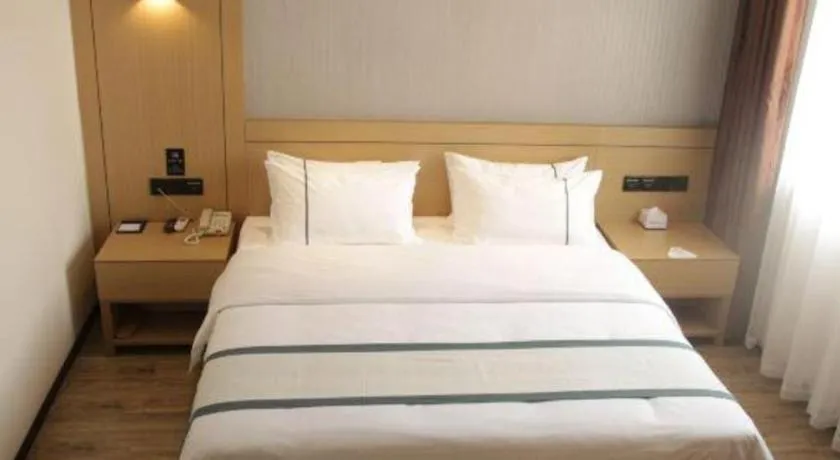 Bed in City Comfort Inn Huanggang Wuxue Bus Center
