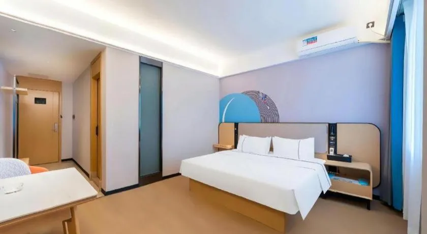 Bed in City Comfort Inn Huanggang Wuxue Bus Center