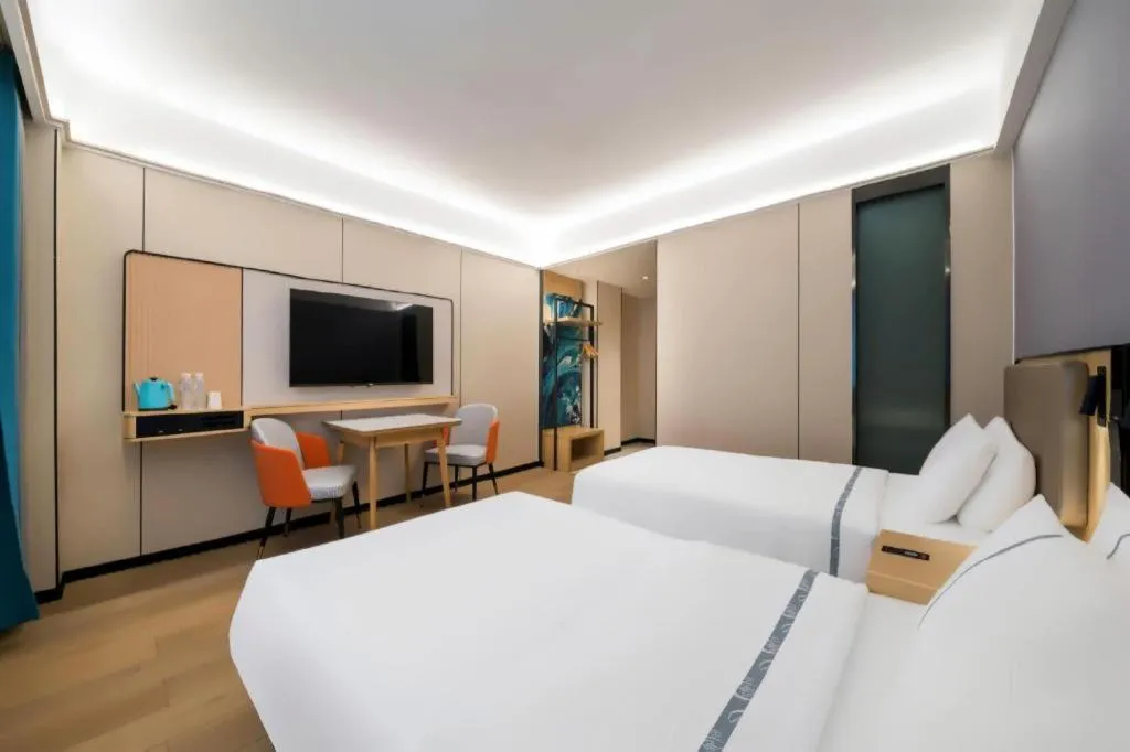 Bed in City Comfort Inn Huanggang Wuxue Bus Center