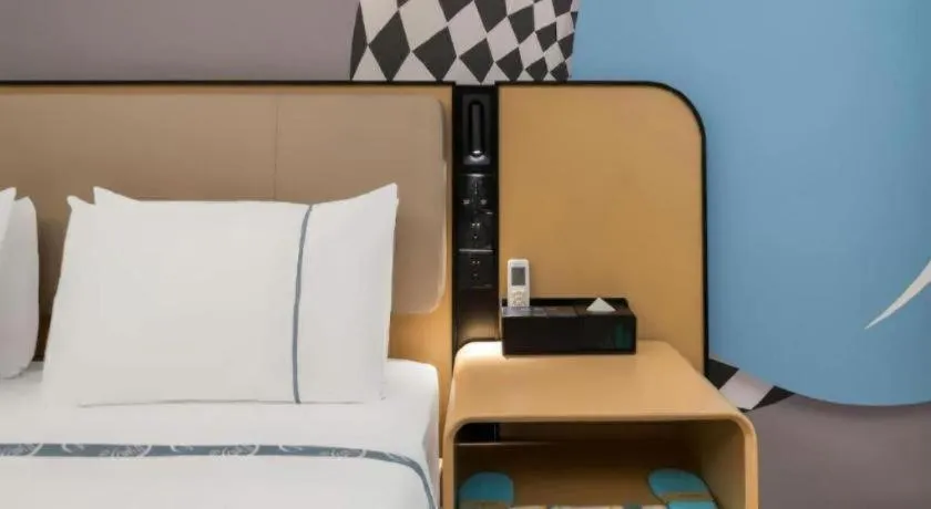 Bed in City Comfort Inn Huanggang Wuxue Bus Center