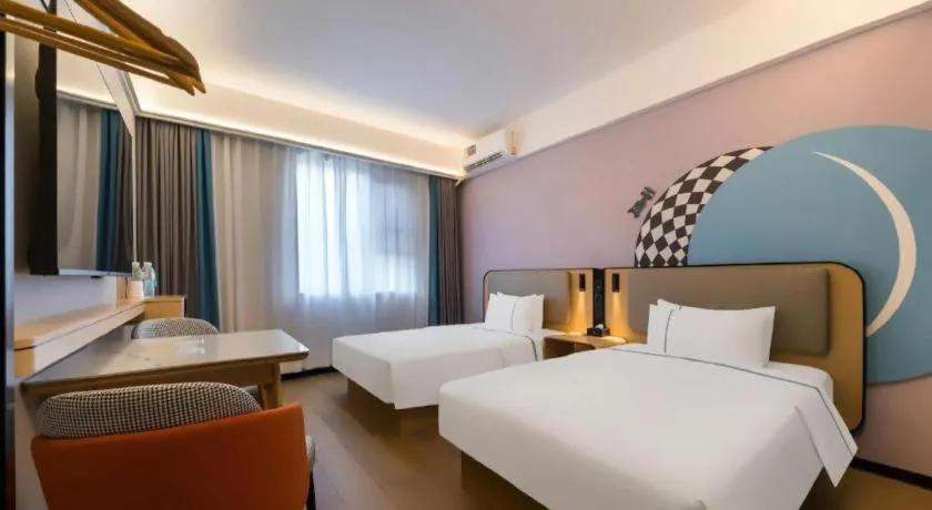 Bed in City Comfort Inn Huanggang Wuxue Bus Center