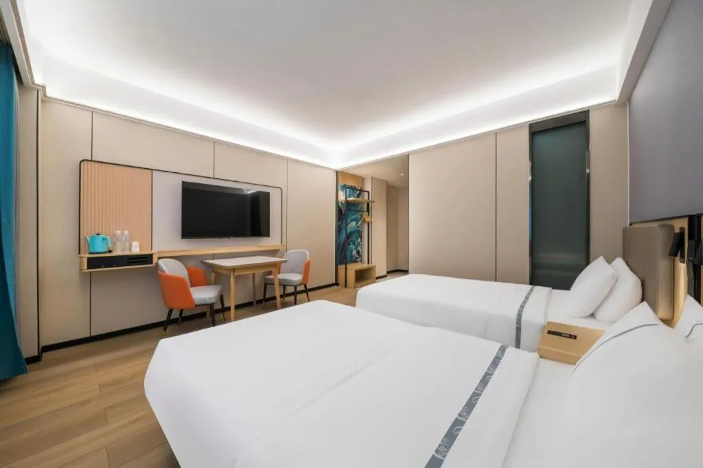 Bed in City Comfort Inn Huanggang Wuxue Bus Center