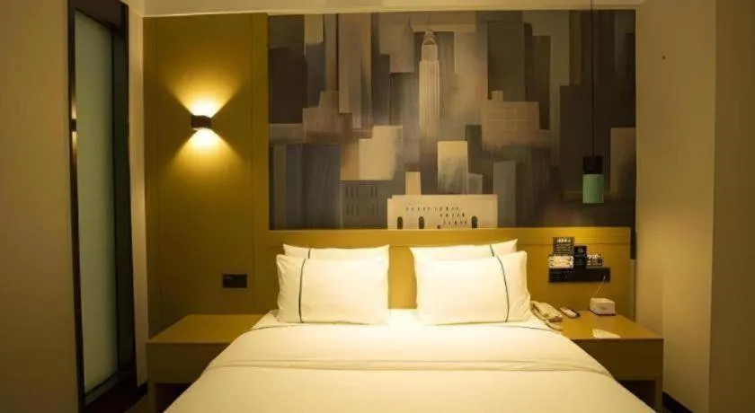 Bed in City Comfort Inn Huanggang Wuxue Bus Center