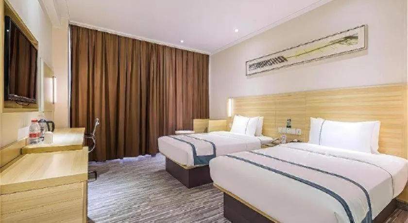Bed in City Comfort Inn Huanggang Macheng City Macheng Square