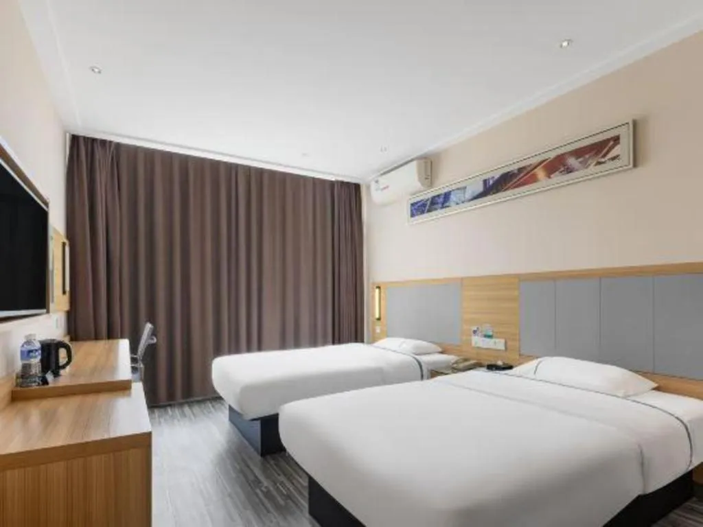 Bed in City Comfort Inn Zhanjiang Seaside Park Guanhai Corridor