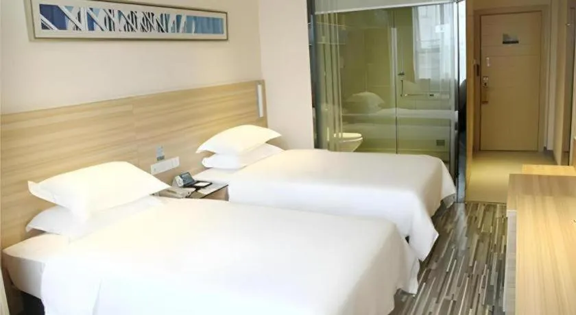 Bed in City Comfort Inn Xianning Chongyang Taoxi Avenue