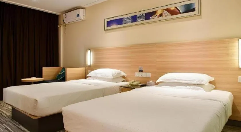 Bed in City Comfort Inn Xianning Chongyang Taoxi Avenue