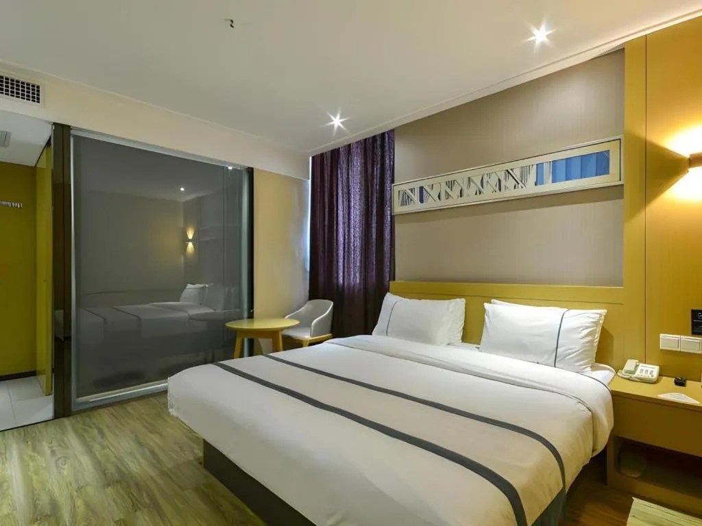 Bed in City Comfort Inn Jingzhou Jianli Jiangcheng Road