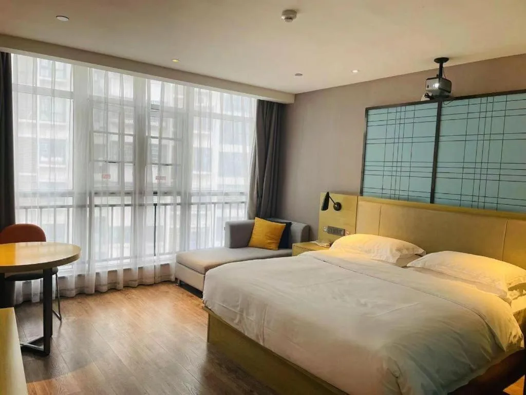 Bed in Echarm Hotel Huangshi Yingbin Avenue