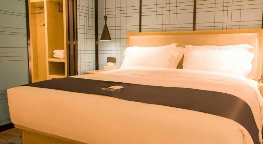 Bed in Echarm Hotel Huangshi Yingbin Avenue
