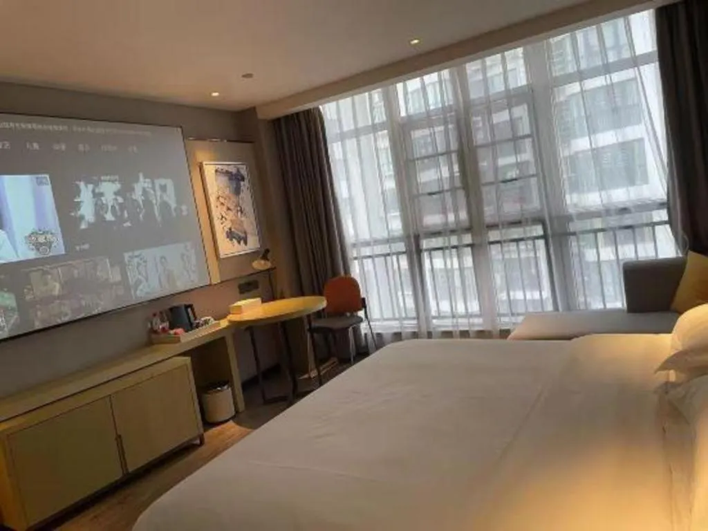 Bed in Echarm Hotel Huangshi Yingbin Avenue
