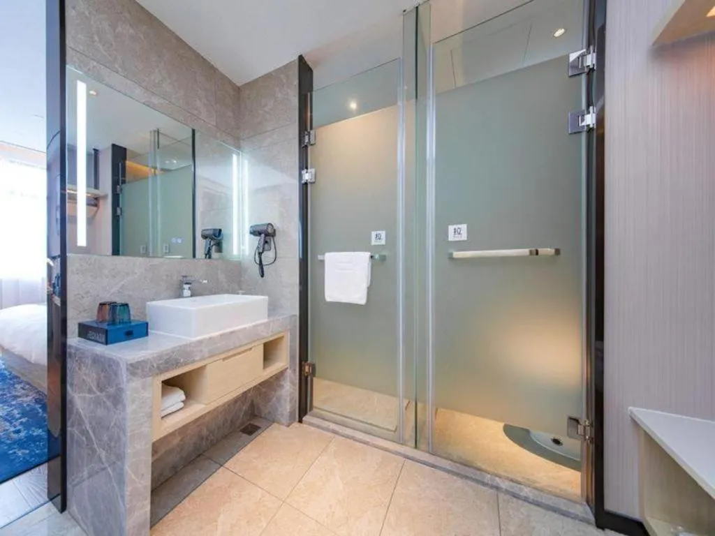 Bed in Echarm Hotel Huangshi Yingbin Avenue