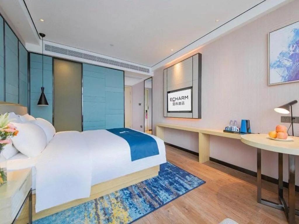 Bed in Echarm Hotel Huangshi Yingbin Avenue
