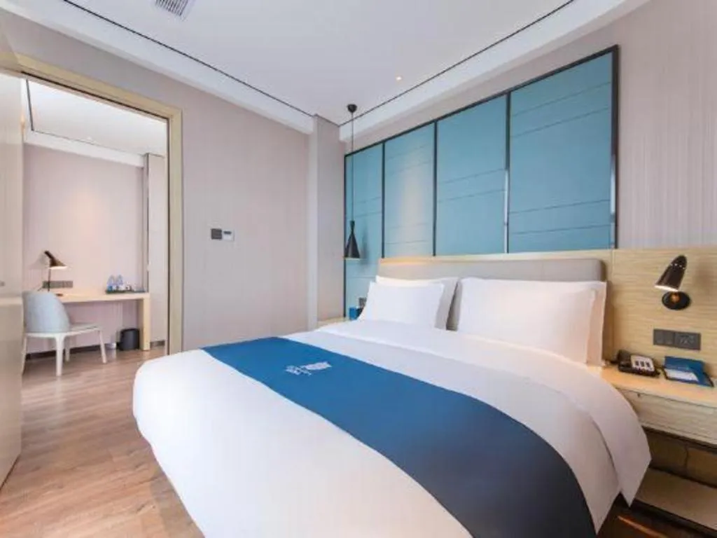 Bed in Echarm Hotel Huangshi Yingbin Avenue