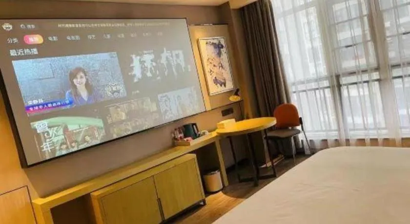 Bed in Echarm Hotel Huangshi Yingbin Avenue