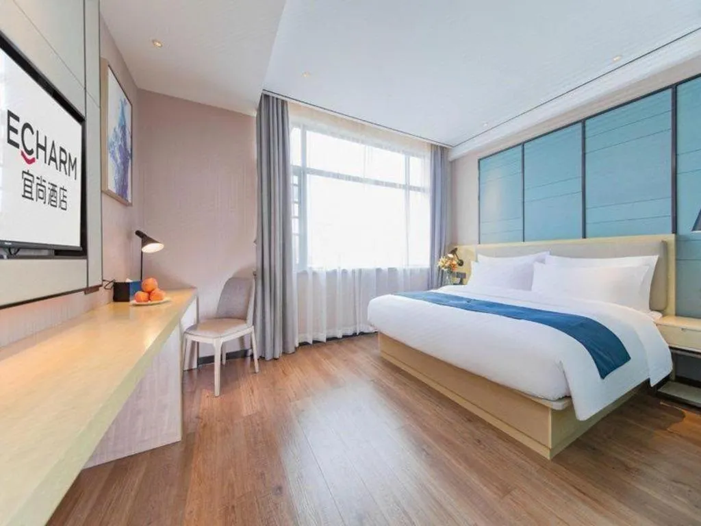 Bed in Echarm Hotel Huangshi Yingbin Avenue