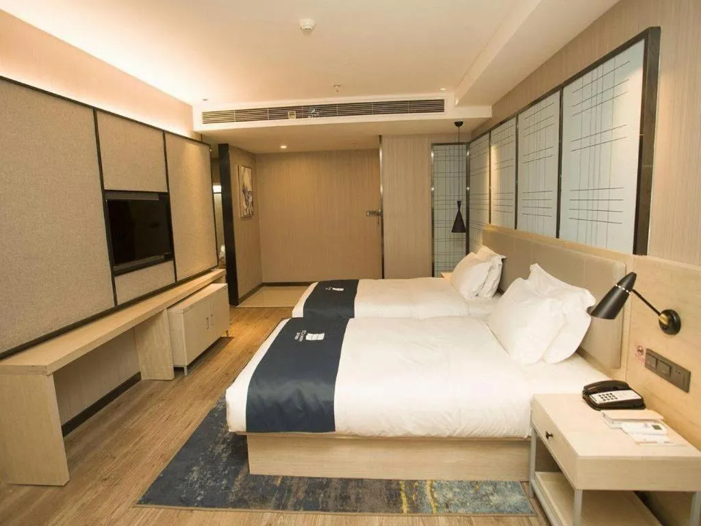 Bed in Echarm Hotel Changchun Jiutai District Government Railway Station