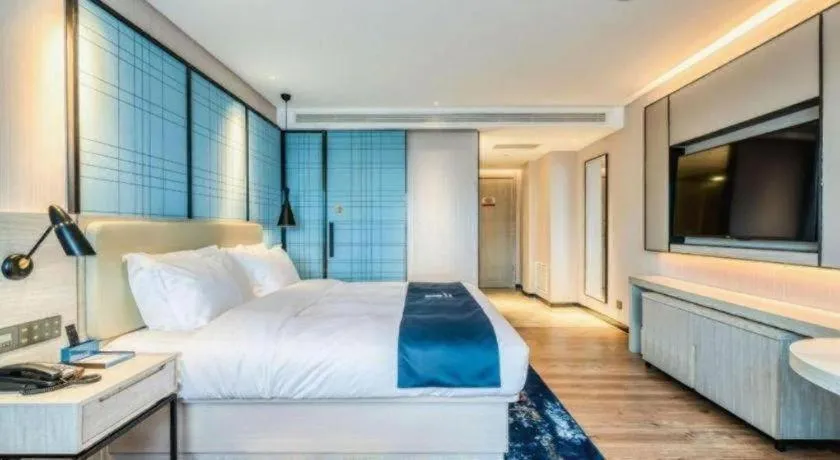 Bed in Echarm Hotel Changchun Jiutai District Government Railway Station