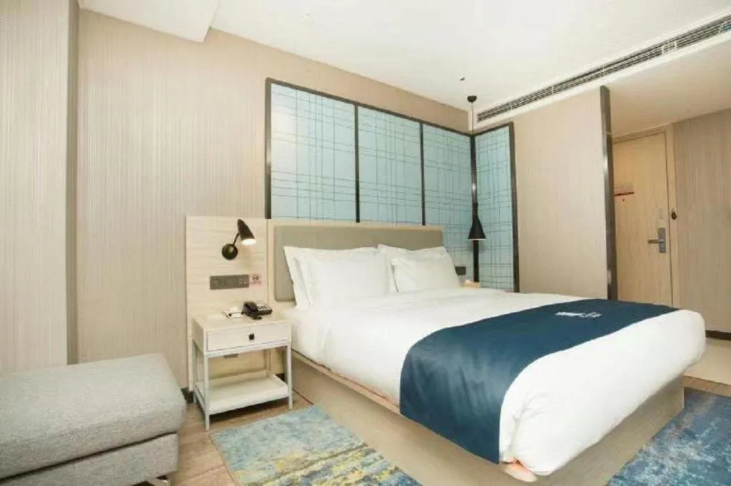 Bed in Echarm Hotel Changchun Jiutai District Government Railway Station