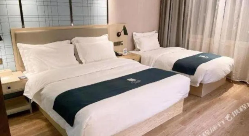 Bed in Echarm Hotel Changchun Jiutai District Government Railway Station