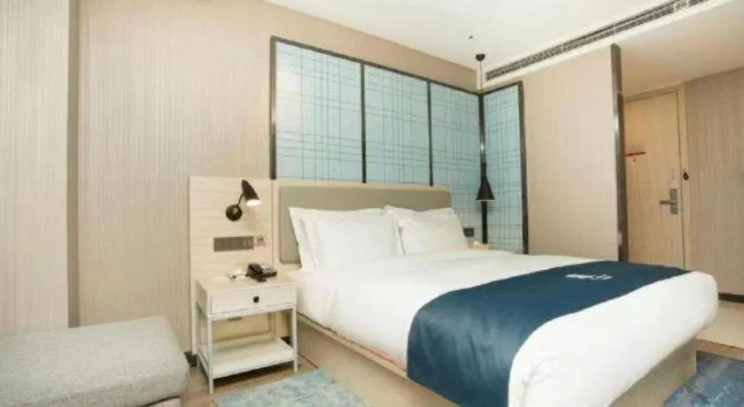 Bed in Echarm Hotel Changchun Jiutai District Government Railway Station