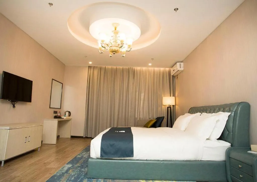 Bed in Echarm Hotel Changchun Jiutai District Government Railway Station