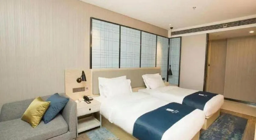 Bed in Echarm Hotel Changchun Jiutai District Government Railway Station