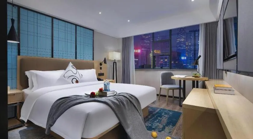 Bed in Echarm Hotel Changchun Jiutai District Government Railway Station