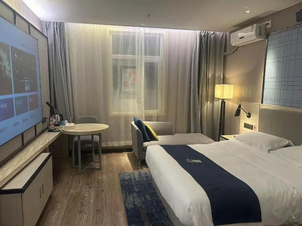 Bed in Echarm Hotel Changchun Jiutai District Government Railway Station