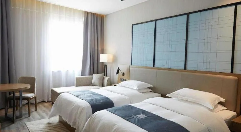 Bed in Echarm Hotel Changchun Jiutai District Government Railway Station