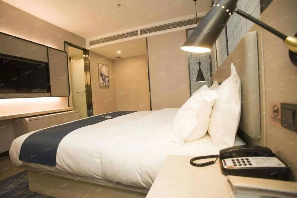 Bed in Echarm Hotel Changchun Jiutai District Government Railway Station