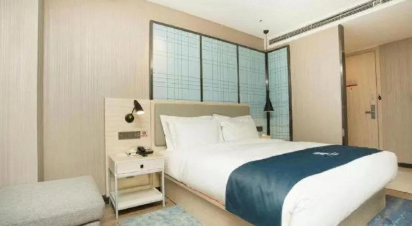 Bed in Echarm Hotel Changchun Jiutai District Government Railway Station