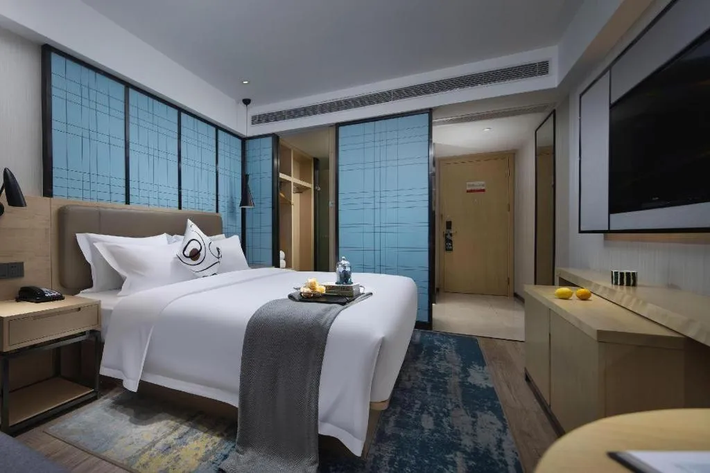 Bed in Echarm Hotel Changchun Jiutai District Government Railway Station