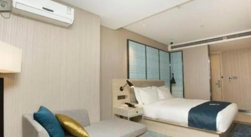 Bed in Echarm Hotel Changchun Jiutai District Government Railway Station