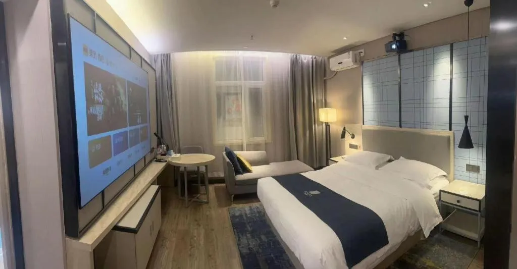 Bed in Echarm Hotel Changchun Jiutai District Government Railway Station