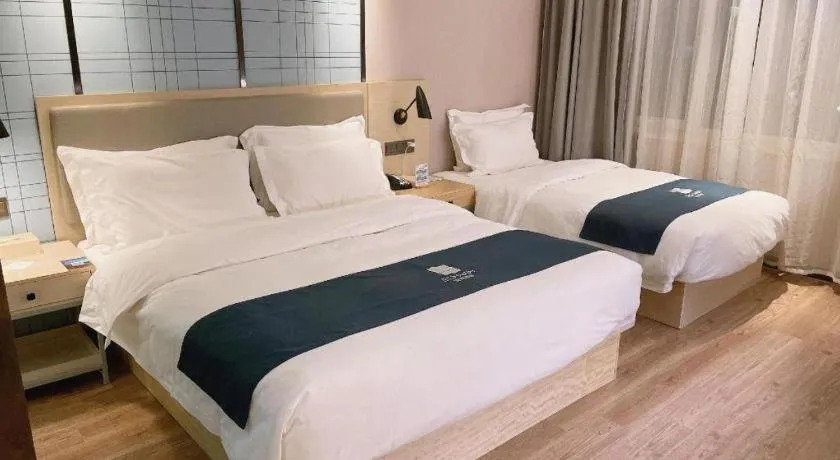 Bed in Echarm Hotel Changchun Jiutai District Government Railway Station
